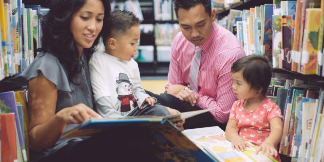 a-family-spending-quality-time-reading-books-in-the-library_t20_KyblQK-888x444.jpg